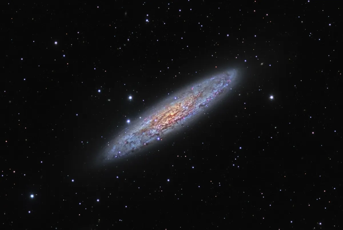 Silver Dollar Galaxy, Ron Brecher and Brett Soames, New South Wales, Australia, October 2015/February 2016. Equipment used: SBIG STXL-6303E CCD camera, custom-built 6-inch refractor, Paramount ME mount, PixInsight.