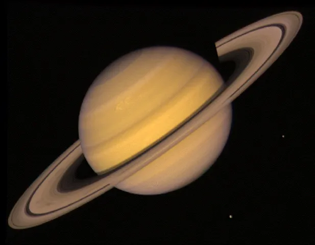 An image of Saturn from Voyager 2. The picture has been colour-enhanced to show in bright details the planet’s surface and the features of the rings. Clearly visible is the gap between the A and B rings, called the Cassini Division. (Credit: NASA/JPL)