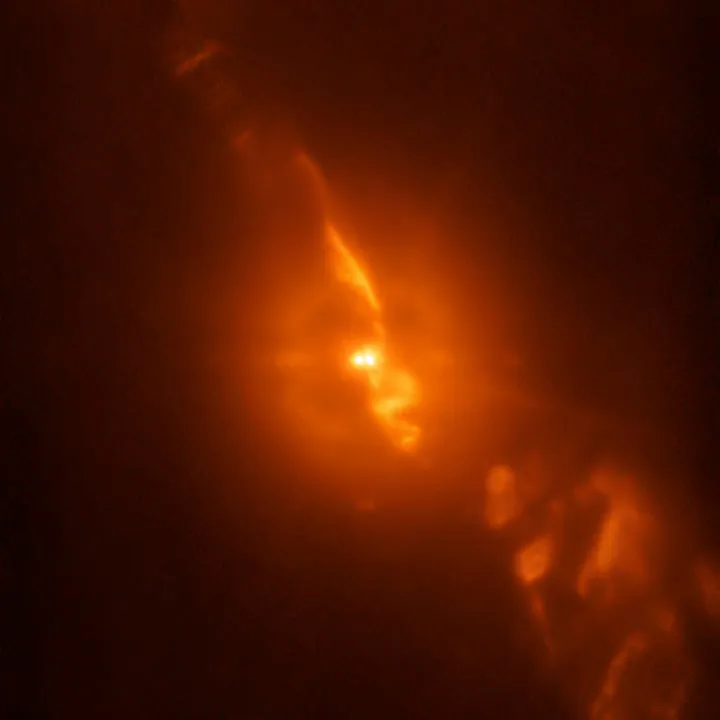 While testing a new subsystem on the SPHERE planet-hunting instrument on ESO’s Very Large telescope, astronomers were able to capture dramatic details of the turbulent stellar relationship in the binary star R Aquarii with unprecedented clarity — even compared to observations from the NASA/ESA Hubble Space Telescope. This image is from the SPHERE/ZIMPOL observations of R Aquarii, and shows the binary star itself, as well as the jets of material spewing from the stellar couple.