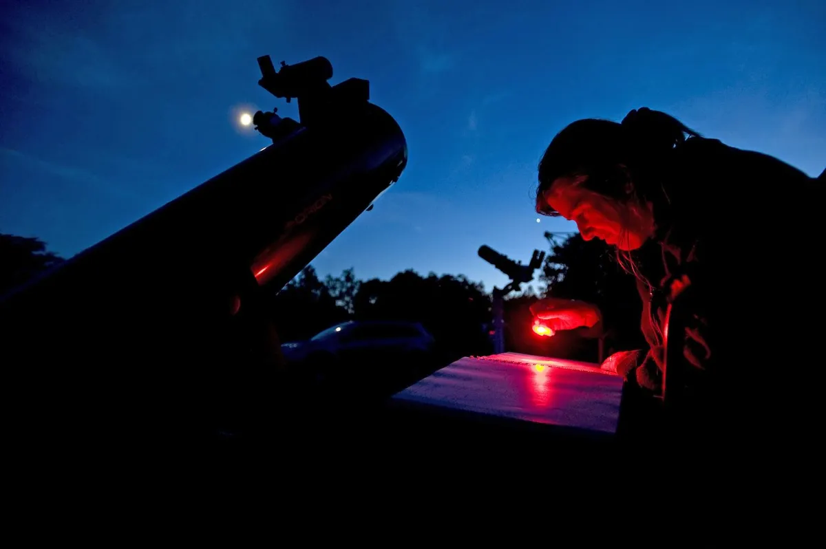 Use a red light torch to help protect your dark-adapted vision. It will make your stargazing session much more fruitful. Credit: Panther Media GMBH/Alamy Stock Photo