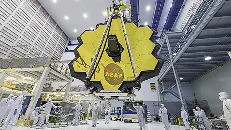 NASA technicians hoist the James Webb Space Telescope’s primary mirror to move it to a clean room at NASA’s Goddard Space Flight Center in Greenbelt, Maryland. Credit: NASA/Desiree Stover
