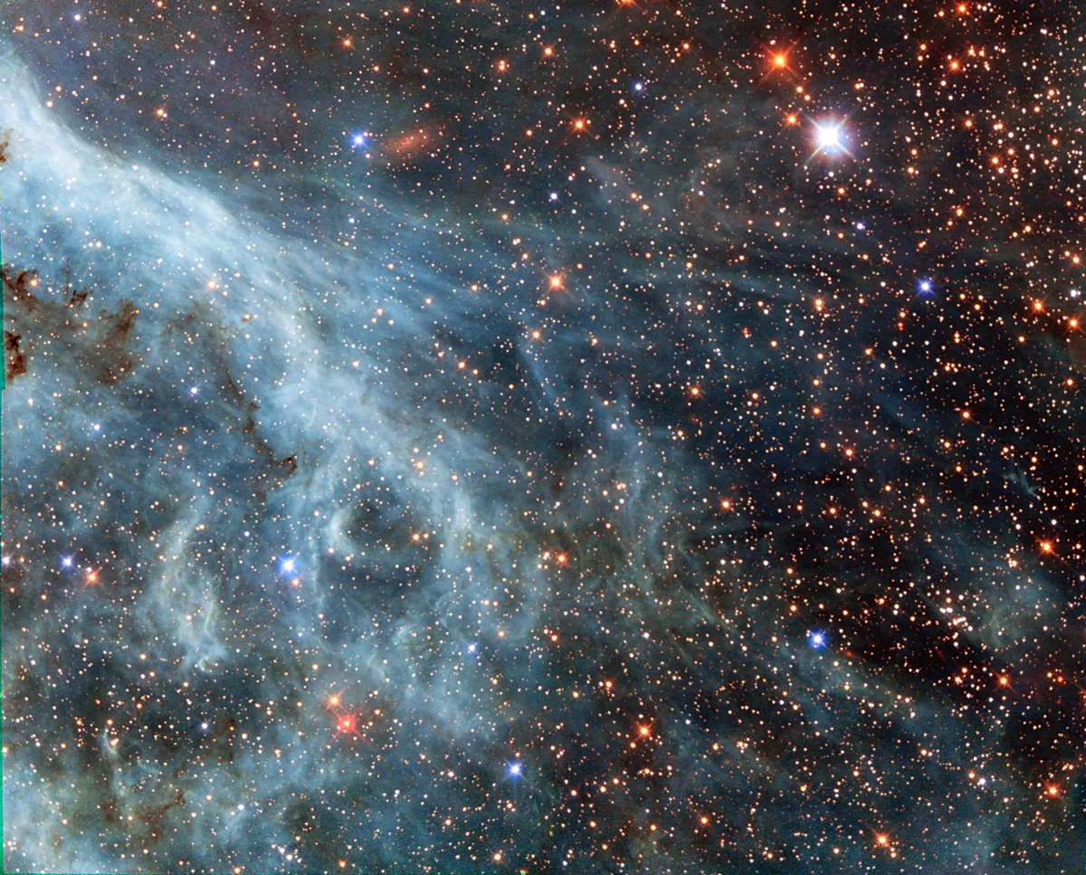 Part of the Large Magellanic Cloud (LMC),image showing the Tarantula Nebula's outskirts. A famously beautiful nebula located within the LMC.