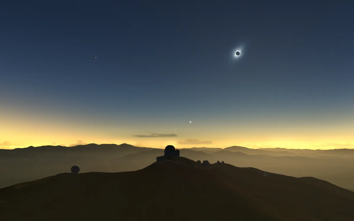 This artist’s impression shows how the total solar eclipse of 2 July 2019 could appear from ESO’s La Silla Observatory in Chile if there are no clouds. The Sun will be quite low in the western sky and, if the skies are clear, several planets and bright stars should be also visible.