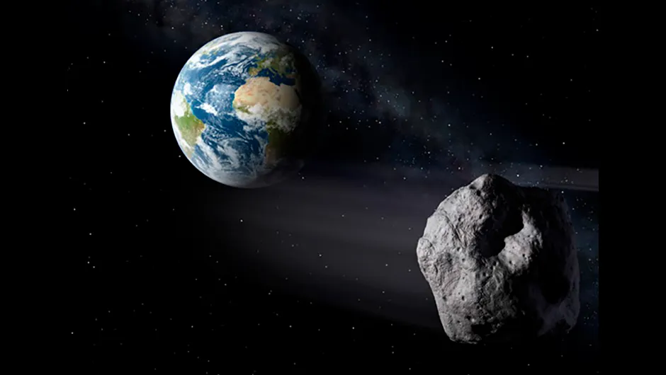 An asteroid passing by Earth (artist's impression). Credit: ESA/P.Carril