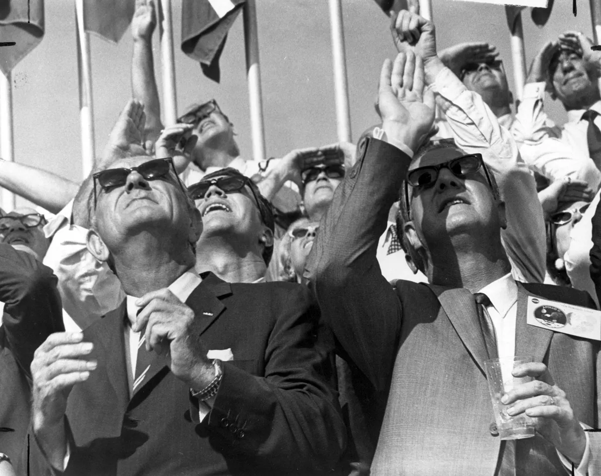 Presidential spectators,July 16, 1969. Surrounded by a crowd of enthusiastic onlookers, US Vice President Spiro T Agnew (right) and former US President Lyndon B Johnson (left) watch the Apollo 11 launch.Credit: NASA