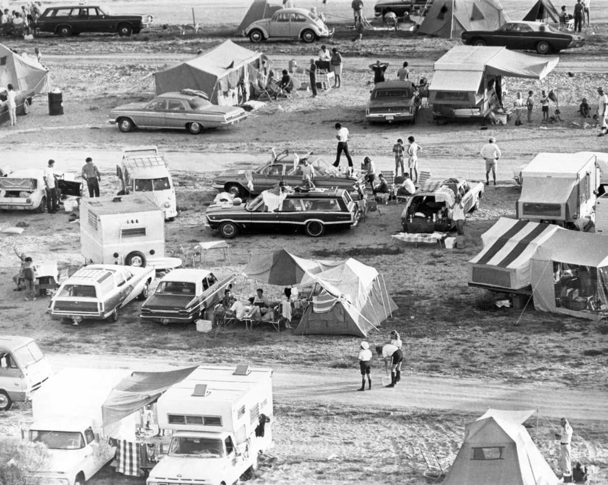 Apollo 11 spectators assemble,July 16, 1969. Pictured is a snippet of the crowds that gathered on roadsides and beaches close to NASA Kennedy Space Center to watch the Apollo 11 launch. Many had camped the night before to ensure they secured a good spot.Credit: NASA