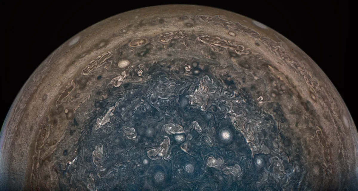 The Juno spacecraft has revealed images of Jupiter's poles, completely different from previous views of its stripy bands and Great Red Spot.Credit: NASA/JPL-Caltech/SwRI/MSSS/John Landino