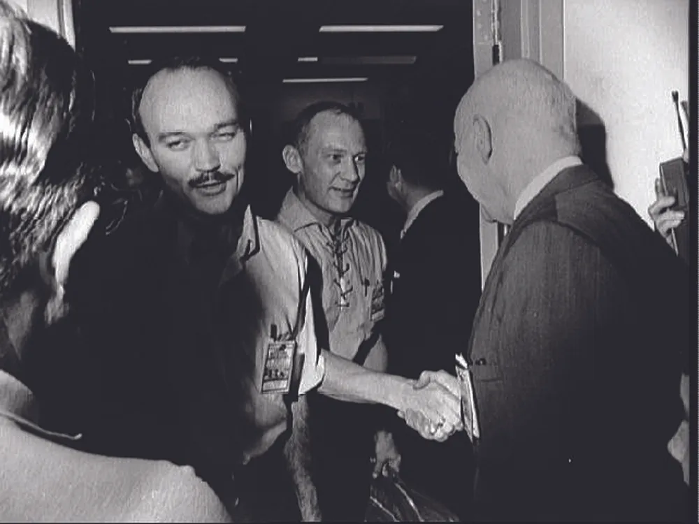 10 August 1969. Collins and Aldrin both look relieved on their release from quarantine in the Lunar Receiving Laboratory. Ahead of them is a 45-day world tour. Credit: NASA