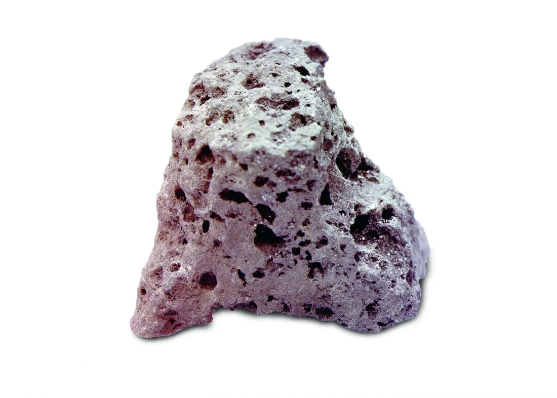 A 5cm long lunar basalt sample returned by Apollo 11 shows many cavities, caused by gas or steam expanding while it was solidifying. Credit: NASA