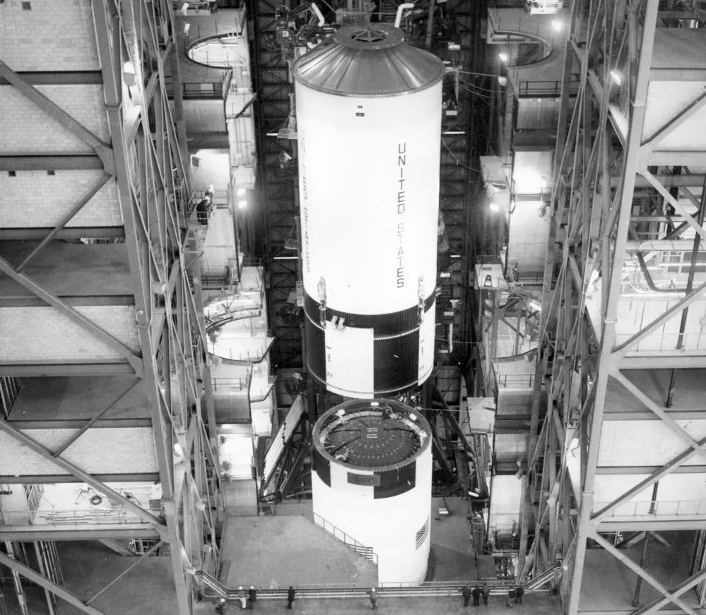 The Saturn V rocket's second stage is lowered on to the first stage at NASA's Kennedy Space Center. Credit: NASA
