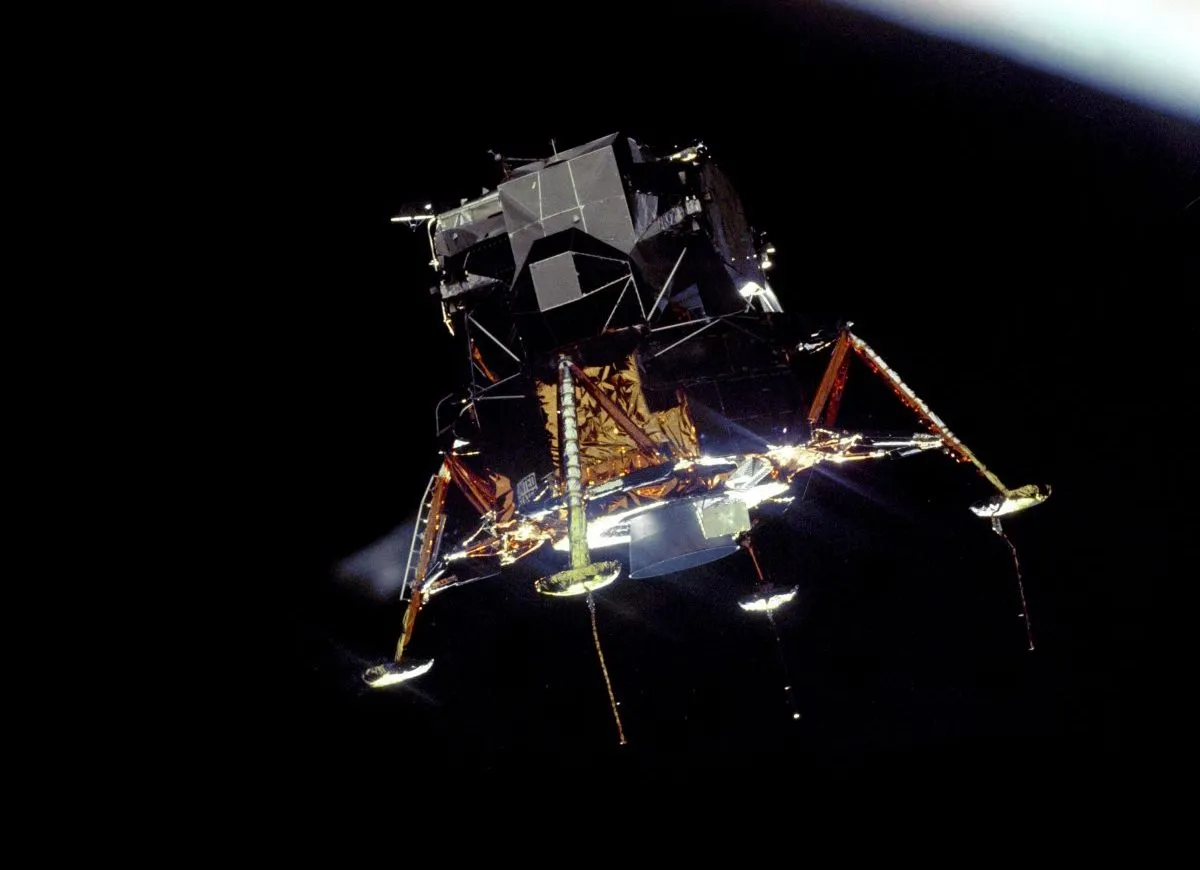 The Apollo 11 Lunar Module gets ready to land. This image was captured from the Command and Service Module. Credit: NASA