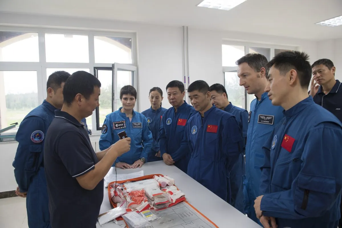 Collaboration between the US and China in space may be currently off-limits, but ESA has been working with the China National Space Administration. In August 2017, ESA astronauts Samantha Cristoforetti and Matthias Maurer joined Chinese colleagues in Yantai, China for some sea survival training. Credit: ESA–Stephane Corvaja, 2017