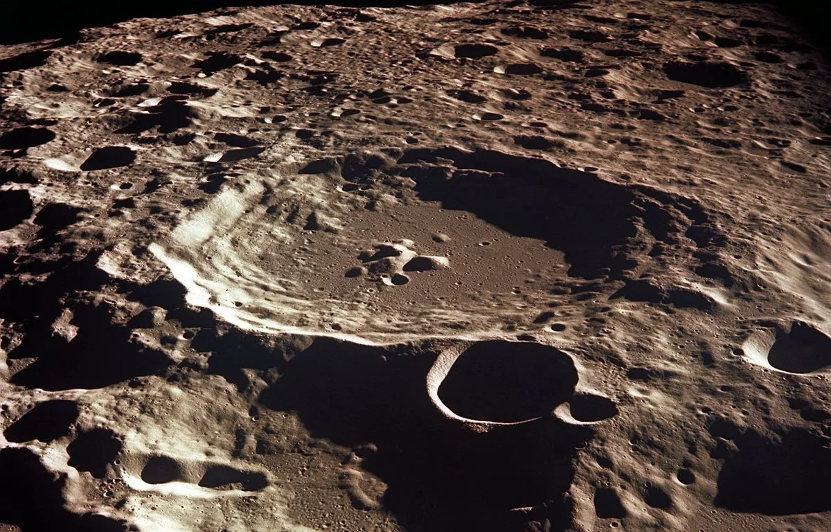 A view of Crater Daedalus on the lunar farside, captured from the Apollo 11 spacecraft in lunar orbit. The rugged surface of the Moon meant that landing was no easy task. Credit: NASA