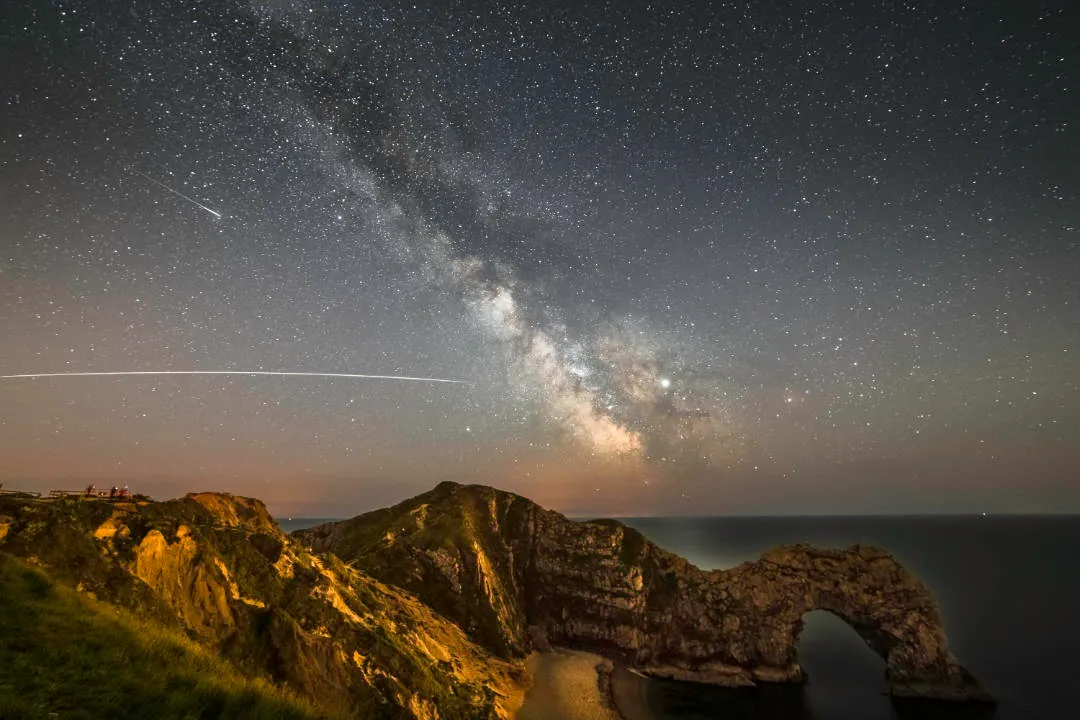 ISS over Durdle Door Kris Walsh, Dorset, 5 May 2019. Equipment: Sony A7 III DSLR camera, Samyang 14mm f2.8 lens, Manfrotto Elements Travel Tripod.