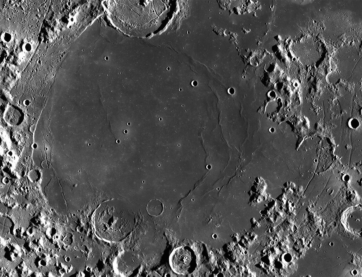 A view of Mare Humorum captured by the Lunar Reconnaissance Orbiter. On the eastern edge can be seen the cracks known as Rimae Hippalus. Credit: NASA (image by Lunar Reconnaissance Orbiter)
