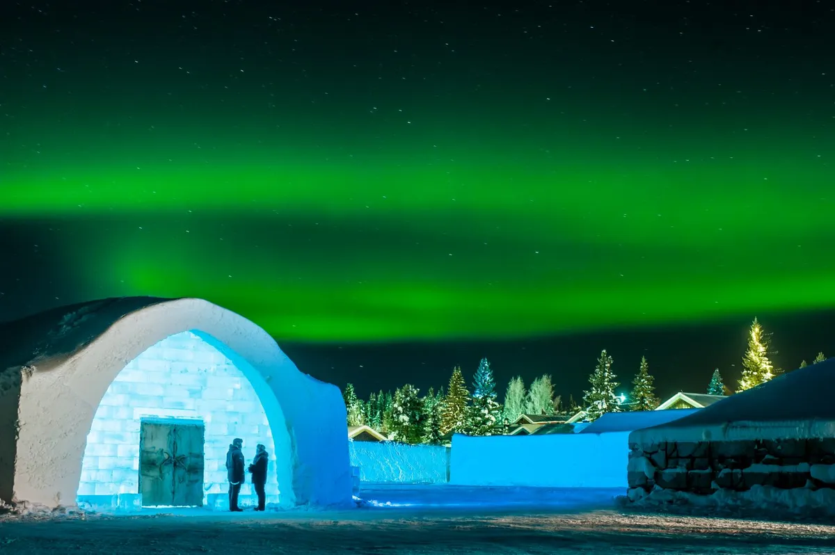 The Northern Lights appear over the ice hotel. Credit: Asaf Kliger