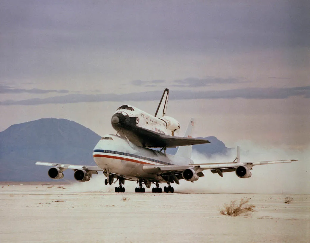 Space Shuttle Columbia pictured atop NASA's Boeing 747 Shuttle Carrier, 6 April 1982, on its journey from White Sands Missile Range in New Mexico back to Kennedy Space Center. Credit: NASA.