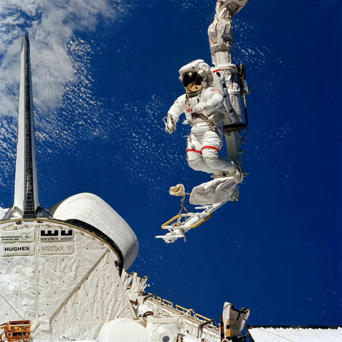 Bruce McCandless spacewalks during a test of the new mobile foot restraint, 7 February 1984. Credit: NASA