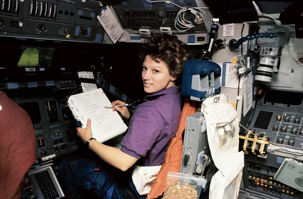 Eileen Collins - the first woman to pilot the Space Shuttle, pictured onboard Discovery during the STS-63 mission, 3 February 1995. Credit: NASA