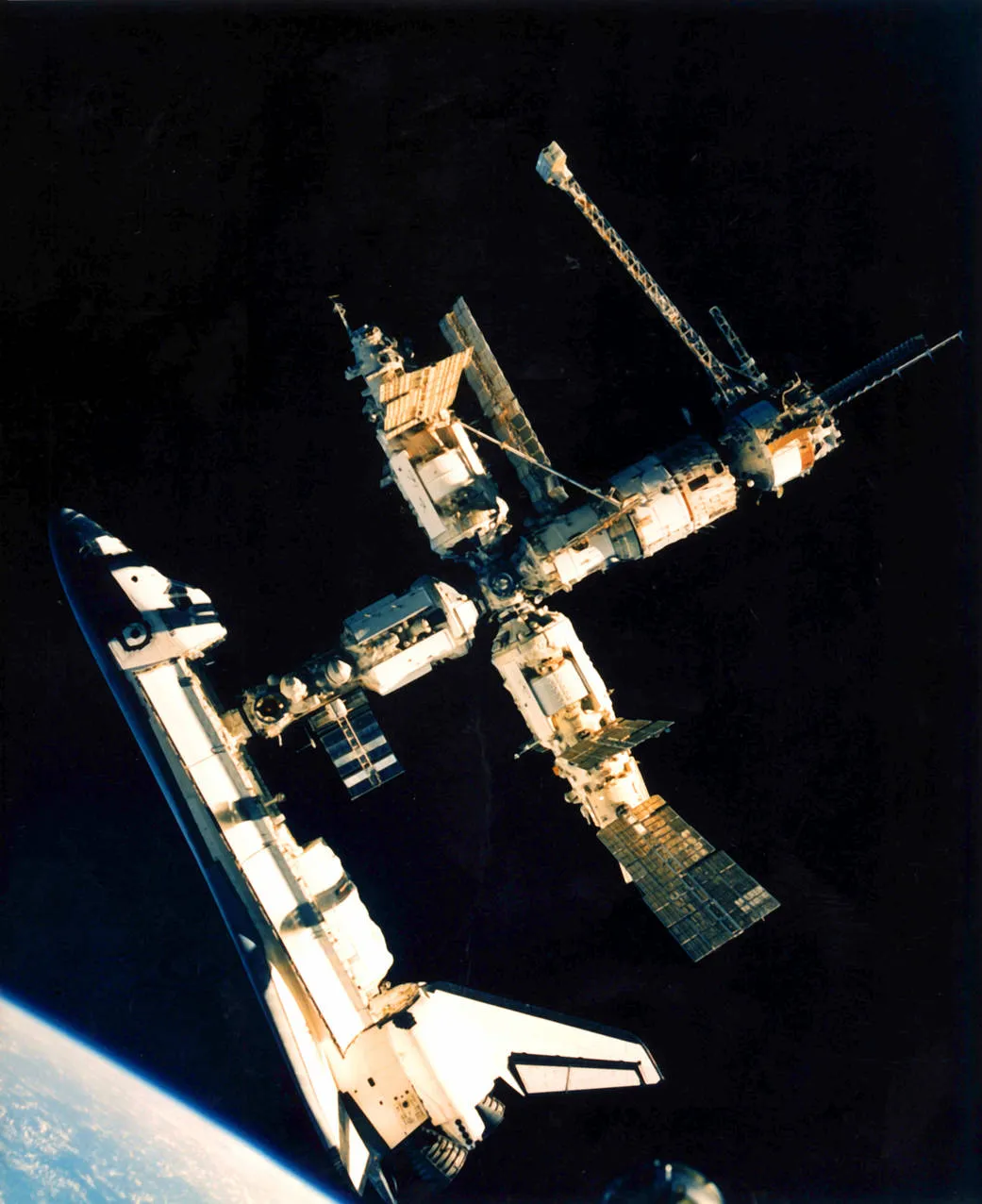 Atlantis makes the first ever Space Shuttle docking with the Russian Mir space station, 29 June 1995. Credit: NASA