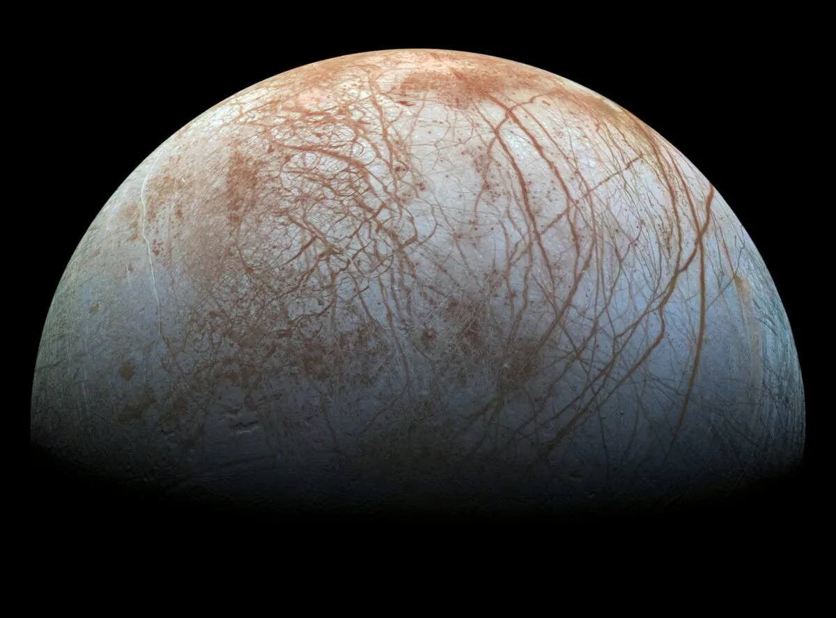 This view of Europa shows long linear cracks crisscrossing across the surface of the icy moon. Credit: NASA/JPL-Caltech/SETI Institut