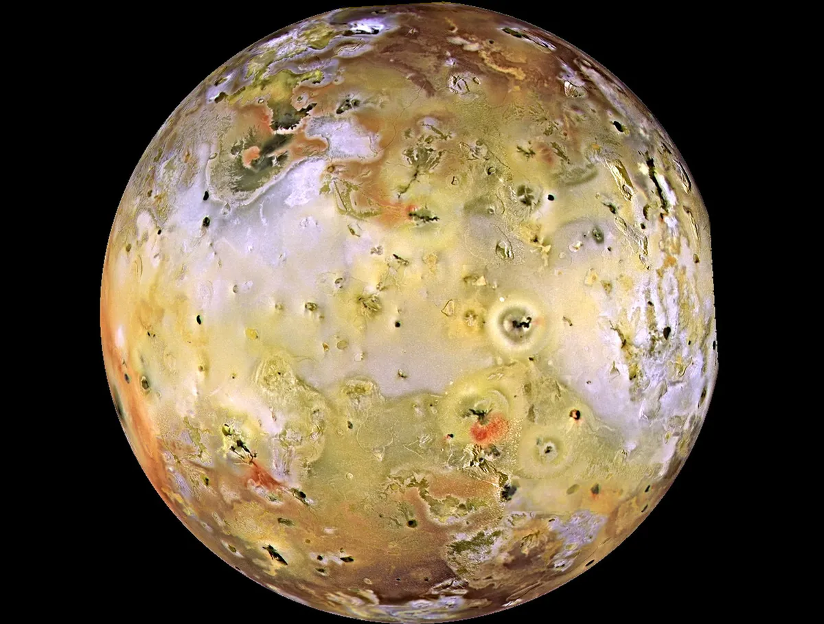 Io's pizza-like surface captured by the Galileo spacecraft in late 1996. This is the side of Io that always faces away from Jupiter. Credit: NASA/JPL/University of Arizona