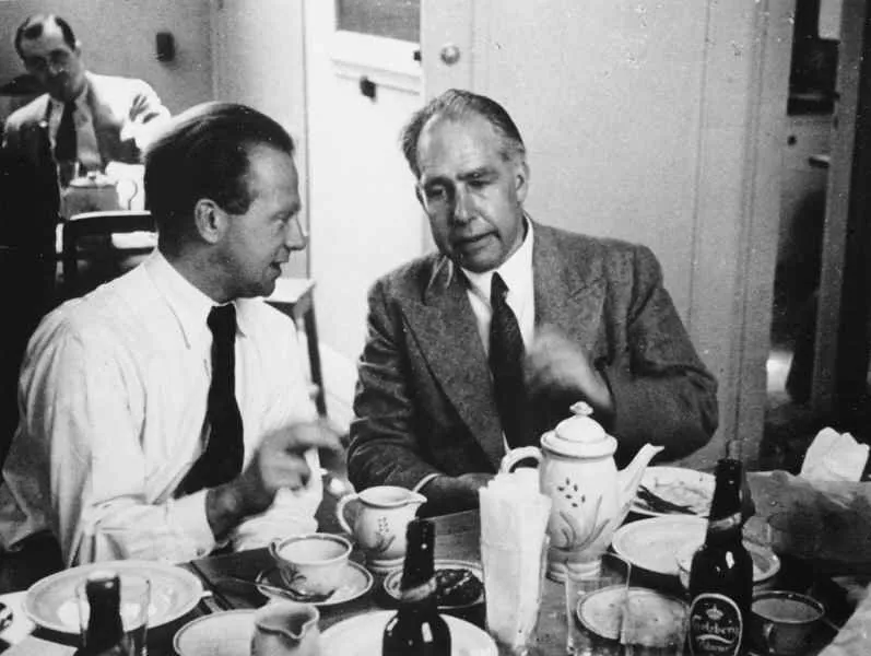 Werner Heisenberg (left) and Niels Bohr (right), two giants of quantum mechanics in the early 20th century, pictured at the Copenhagen Conference in 1934. Credit: Fermilab, U.S. Department of Energy