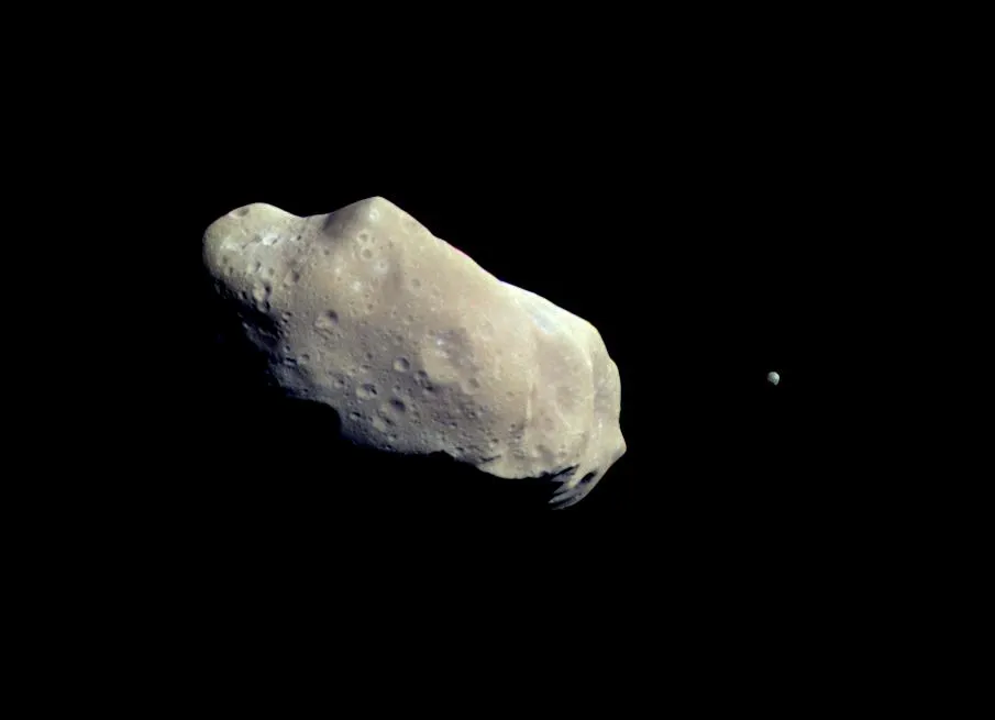 Galileo's image of asteroid Ida and its moon Dactyl: the first satellite ever discovered around an astroid. This image was captured 14 minutes before Galileo's closest approach on 28 August 1993. Credit: NASA/JPL