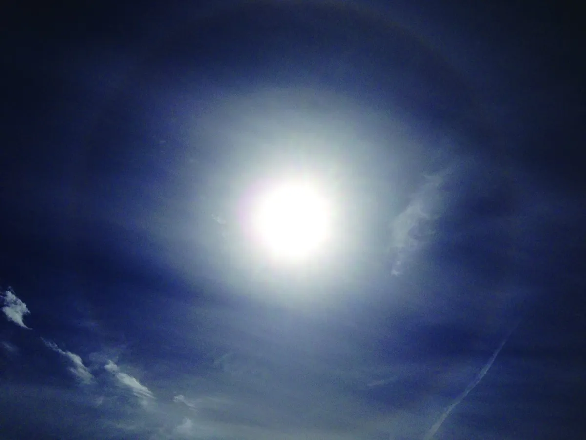 Also watch out for solar haloes, appearing as rings around the Sun; they’re caused by ice particles refracting light. Credit: Pete Lawrence