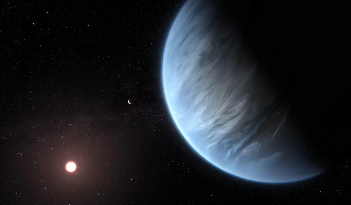 An artist’s impression showing exoplanet K2-18b, its host star and an accompanying planet in this system. Credit: ESA/Hubble, M. Kornmesser