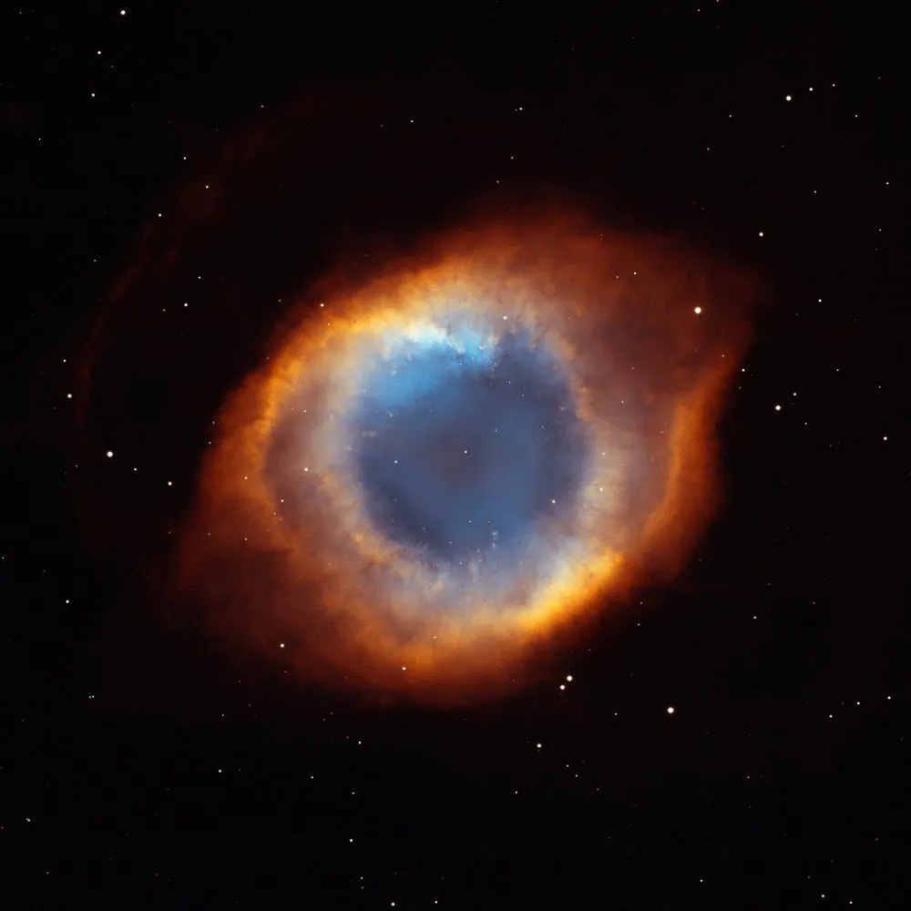 The Helix Nebula. These nebulae look spherical through a telescope, so are called ‘planetary nebulae’ despite having nothing to do with planets. Credit: NASA, NOAO, ESA, Hubble Helix Nebula Team, M Meixner and T A Rector