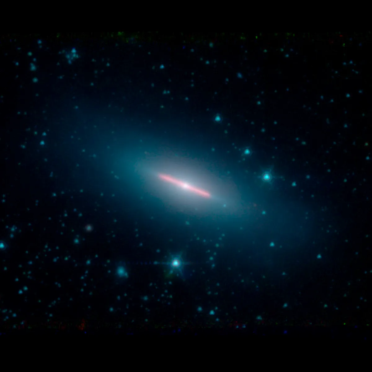 Spitzer Spots a Perfectly Sideways Galaxy. Credit: NASA/JPL-Caltech