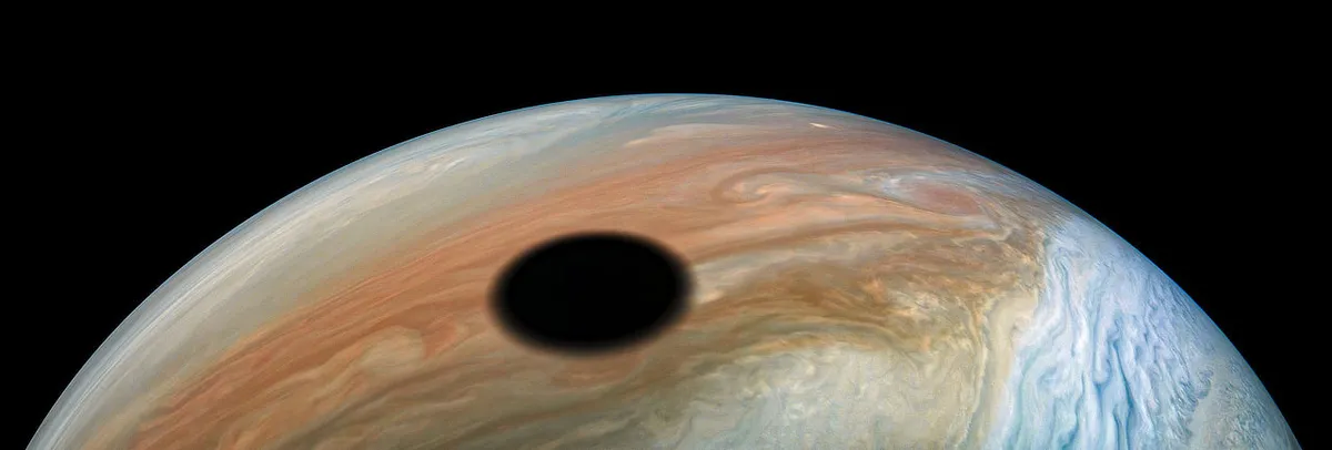 The moon Io's shadow cast on Jupiter, captured by Juno on 11 September 2019 Credit: NASA/JPL-Caltech/SwRI/MSSS / Kevin M. Gill, © CC BY 3.0