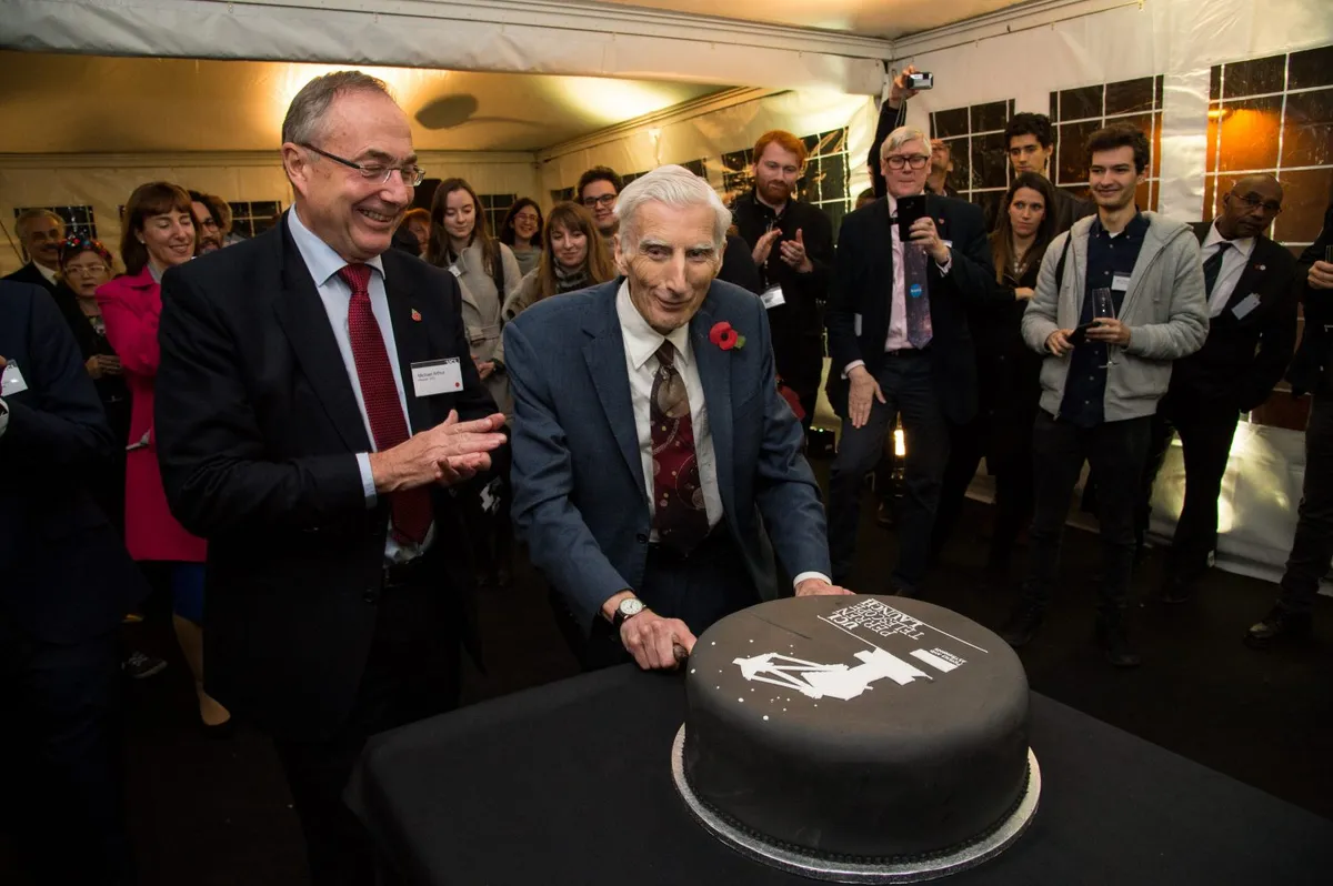 Astronomer Royal Martin Rees cuts the cake at the UCL Observatory Perren telescope unveiling event  (Image by Kirsten Holst)