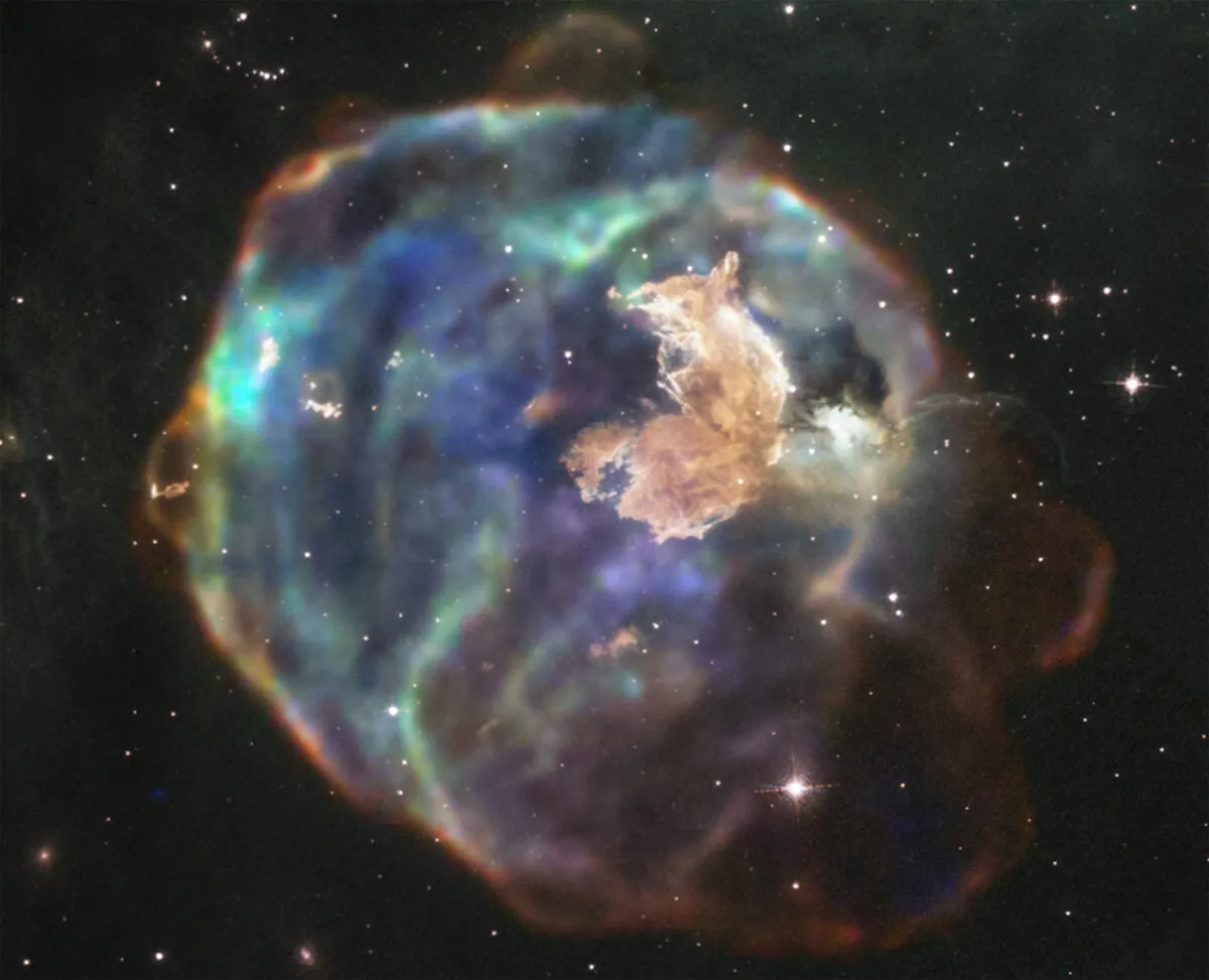 Supernova remnant LMC N63A. Credit Enhanced Image by Judy Schmidt (CC BY-NC-SA) based on images provided courtesy of NASA/CXC/SAO & NASA/STScI.)