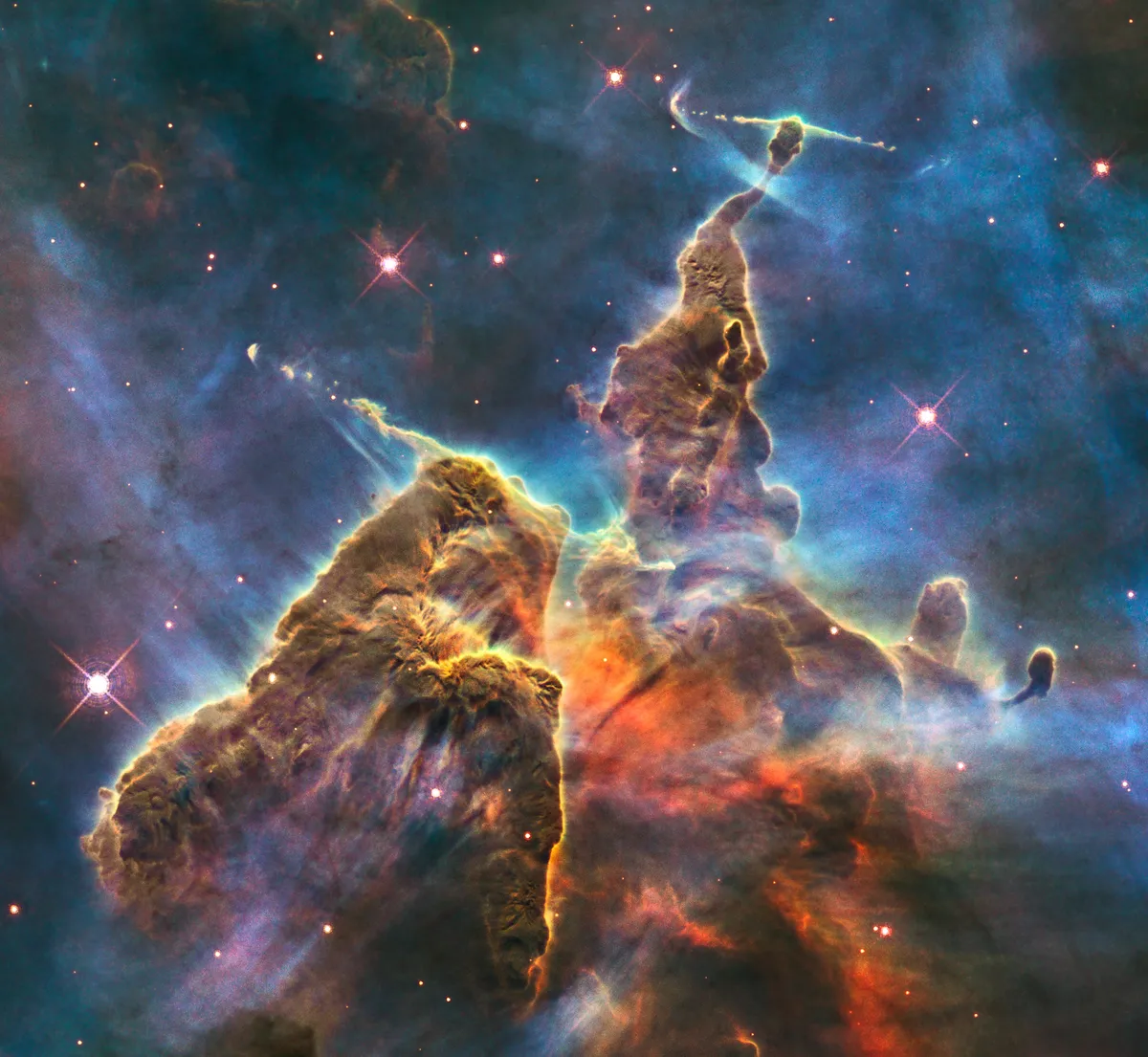 Carina Nebula 23 April 2010. Hubble captures the turbulent cosmic pinnacle within a tempestuous stellar nursery called the Carina Nebula. Stacks of gas and dust, ‘Pillars of Creation’, are three lightyears tall. Credit: NASA, ESA, M. Livio Hubble 20th Anniversary Team (STScI)