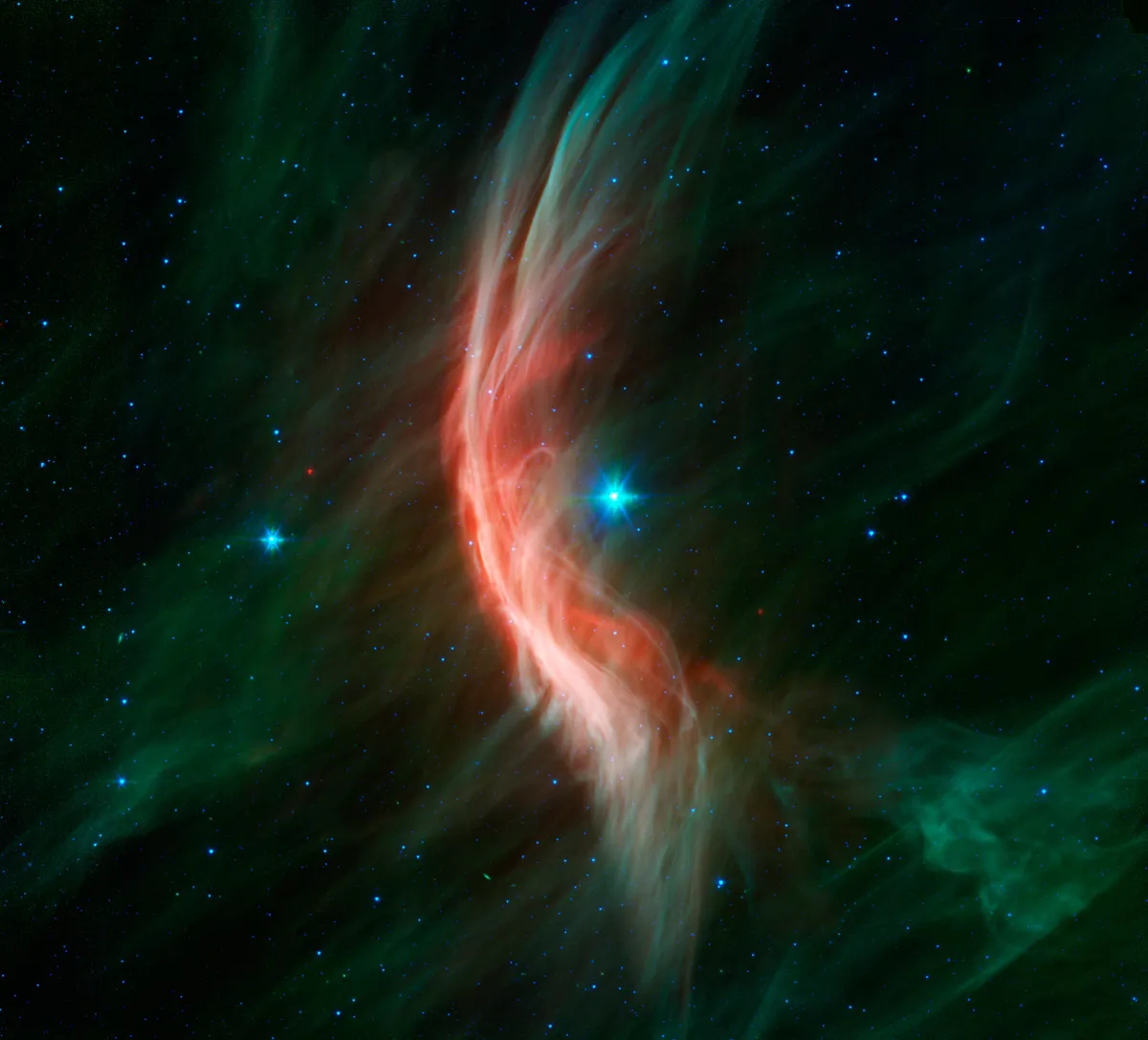 Zeta Ophiuchi Massive stellar winds from giant star Zeta (z)Ophiuchi cause ripples in its surroundings to generate a spectacular bow shock. Credit: NASA/JPL-Caltech