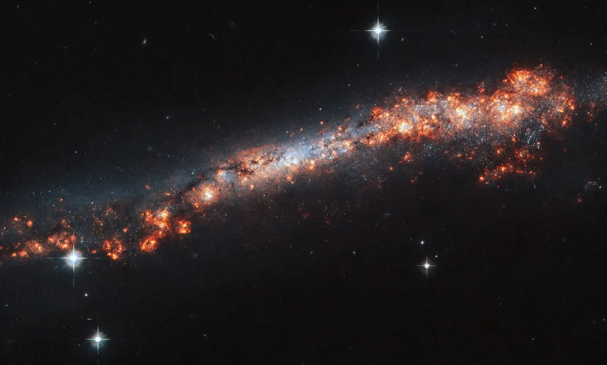 NGC 3432 29 July 2019. The outer reaches of galaxy NGC 3432, viewed directly edge-on. Credit: ESA/Hubble & NASA, A. Filippenko, R. Jansen