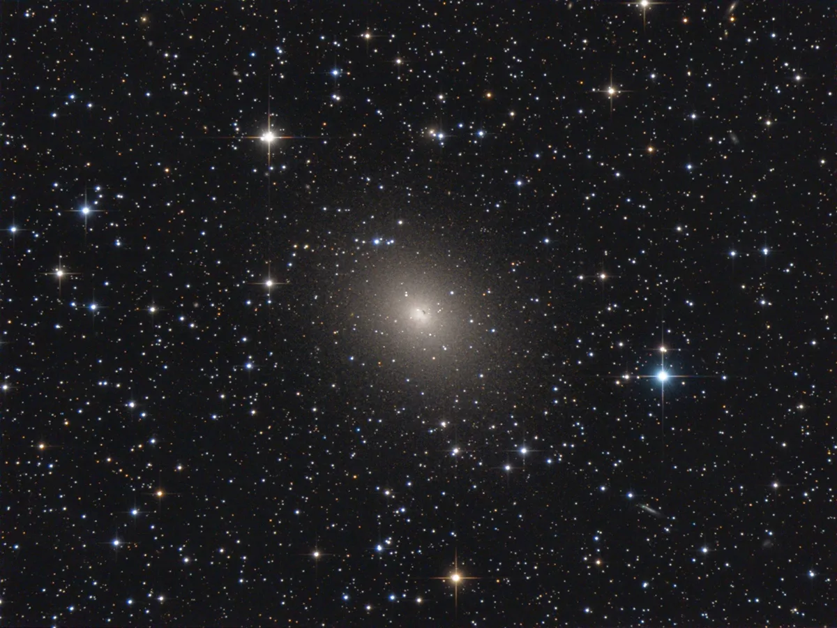 NGC 185 is a satellite galaxy of M31. Credit: Bernhard Hubl / CCDGuide.com