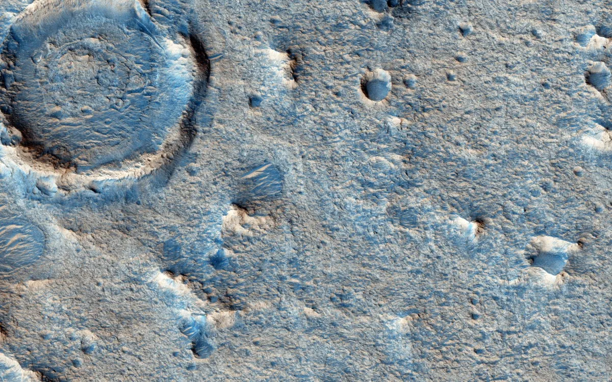A view of Oxia Planum as seen by NASA's Mars Reconnaissance Orbiter. Mars missions have identified iron-magnesium rich clays in the are that may be result of alteration of volcanic sediments. Credit: NASA/JPL/University of Arizona