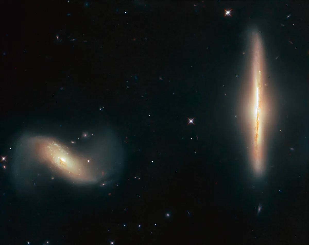 Two spiral galaxies captured by the Hubble Space Telescope. Credit: ESA/Hubble & NASA, K. Larson et al.