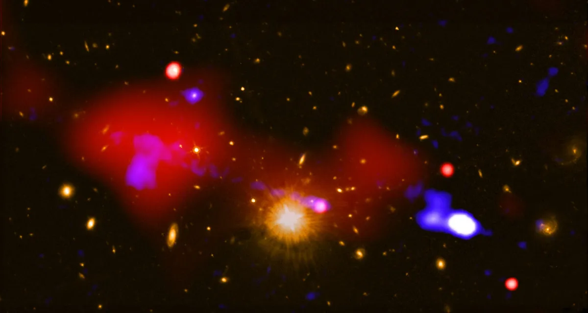 A black hole within a host galaxy. Credit: NASA/CXC/INAF/R. Gilli et al.; Radio NRAO/VLA; Optical: NASA/STScI
