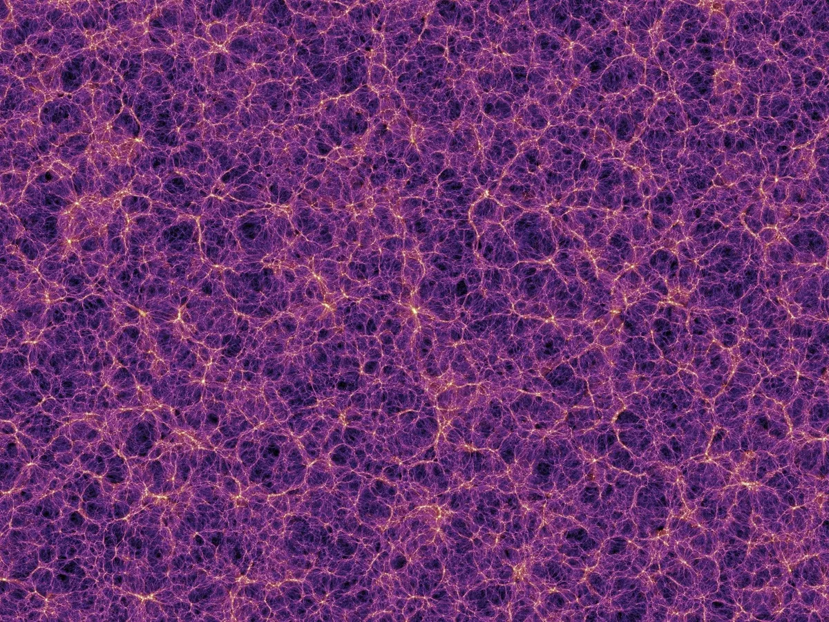 A view of the cosmic web. Each yellow dot represents a galaxy. Credit: Millenium Simulation Project