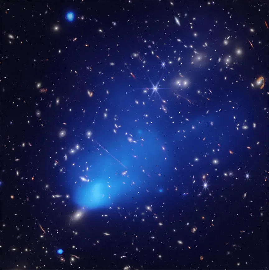 Galaxy cluster ACT-CL J0102-4915, known as 'El Gordo' ('the fat one' in Spanish), is thought to contain 3 million billion (3,000,000,000,000,000) times the mass of the Sun. Credit: X-ray: NASA/CXC/Rutgers/J. Hughes et al.; Infrared: NASA/ESA/CSA, J.M. Diego (IFCA), B.Frye (Univ. of Arizona), P.Kamieneski, T.Carleton & R.Windhorst (ASU);