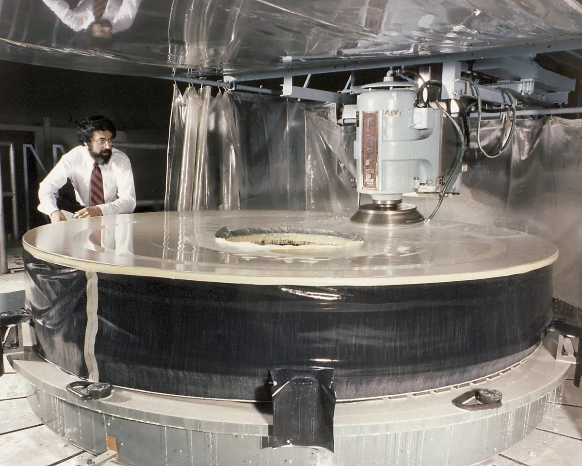 The grinding of Hubble's primary mirror, at the Perkin-Elmer Corporation's large optics fabrication facility in 1979. Credit: NASA