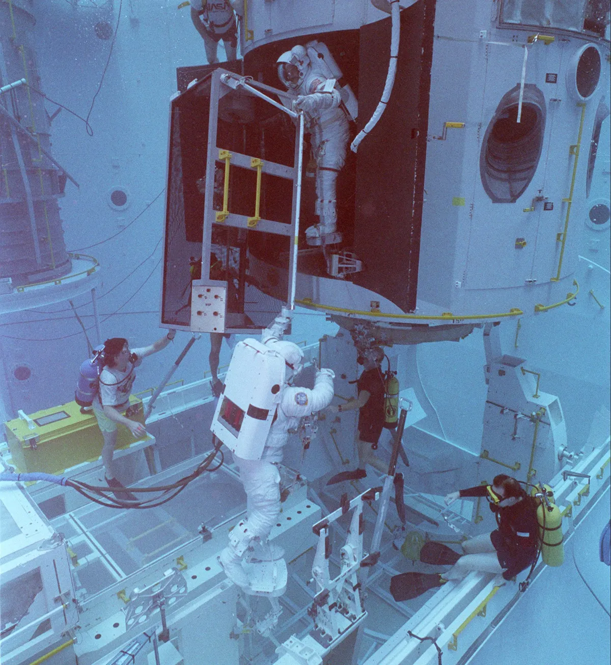 One of the STS-61 crew trains in the Neutral Buoyancy Simulator at the Marshall Space Flight Center. Credit: NASA