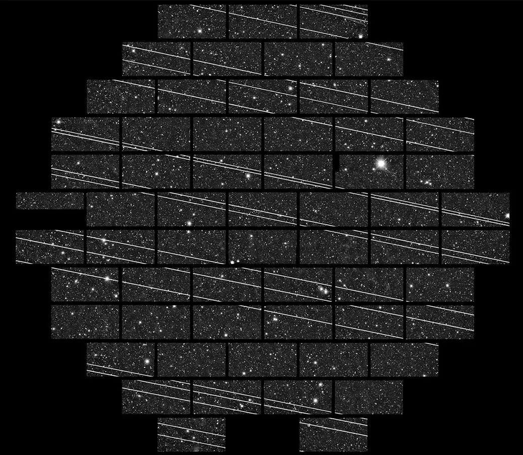 A 333-second exposure captured using the Blanco 4m telescope at the Cerro Tololo Inter-American Observatory (CTIO) shows 19 streaks that astronomers attributed to Starlink satellites. Credit: NSF’s National Optical-Infrared Astronomy Research Laboratory/CTIO/AURA/DELVE