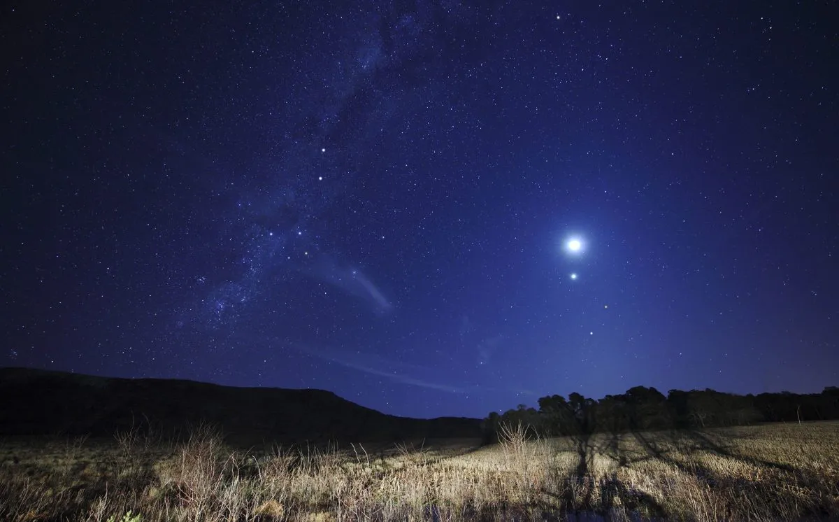 A conjunction of the Moon, Venus, Mars and Spica, Azul, Argentina. Credit: Stocktrek Images/Luis Argerich/Getty