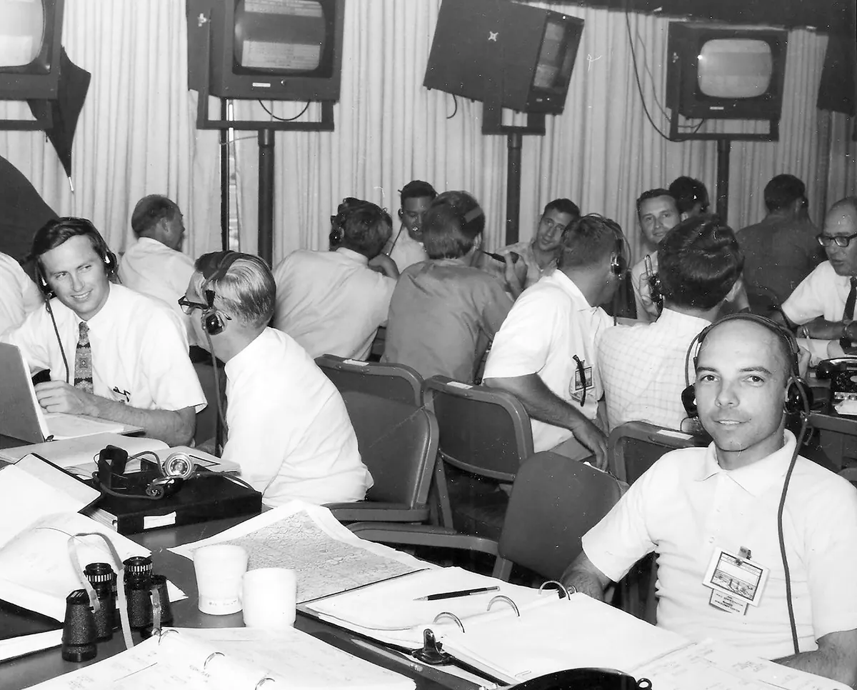 Jerry Woodfill (left) is on hand in the mission evaluation room during the Apollo 11 mission. Credit: NASA
