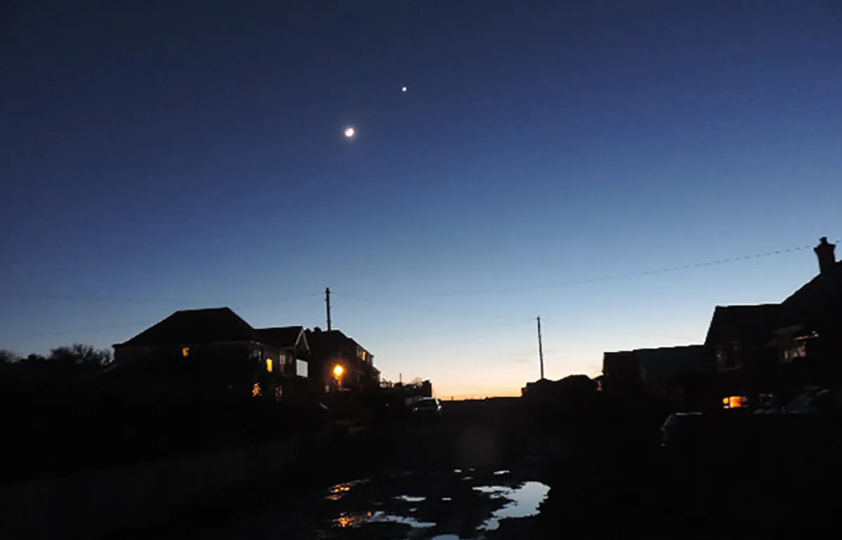 Tony Titchener captured this beautiful image of a crescent Moon and Venus on 27 February 20202, before lockdown began. Tony captured it on 27 February 2020 from Seaford, Sussex, UK using a handheld Nikon Coolpix 520 bridge camera. Credit: Tony Titchener